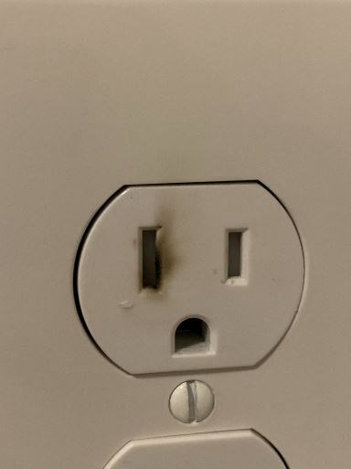 Burnt outlet due to arcing in a home for CK electric