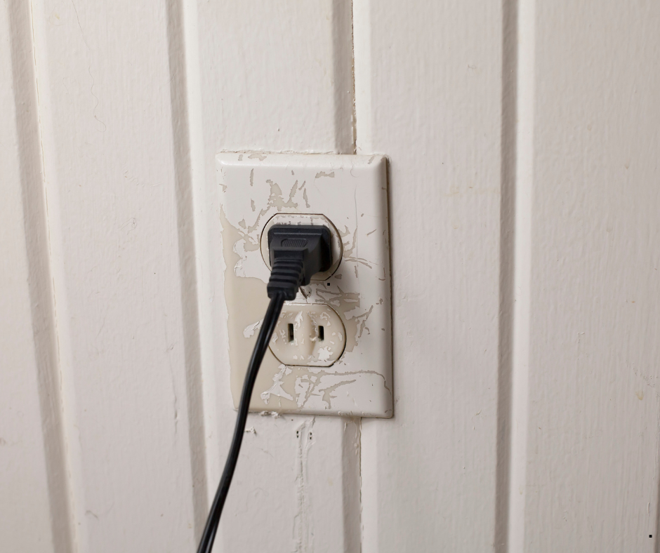 old-two-pronged-outlet-that-is-no-longer-safe.-CK-electric-Blog-buying-an-old-Westminster-home-Electrical-issues